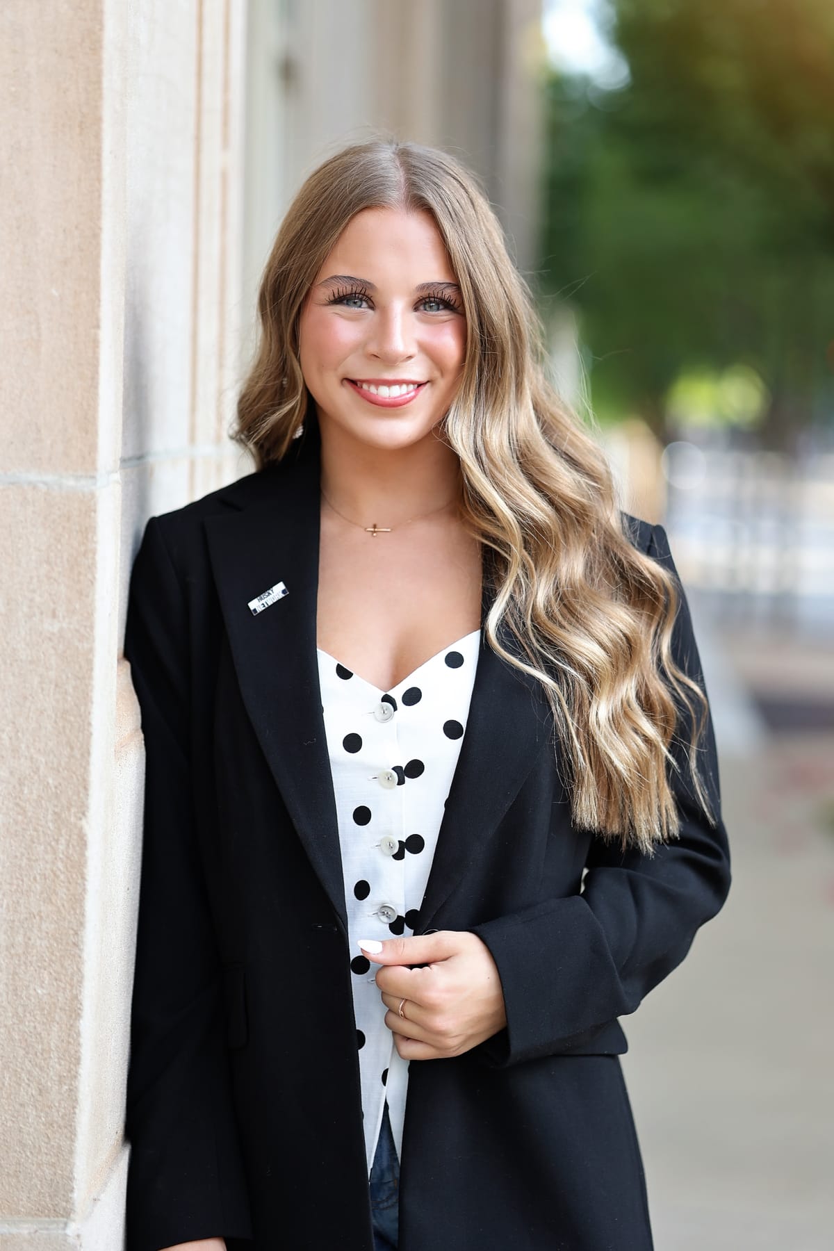 Violet Iver in a black blazer with a Husky Network pin